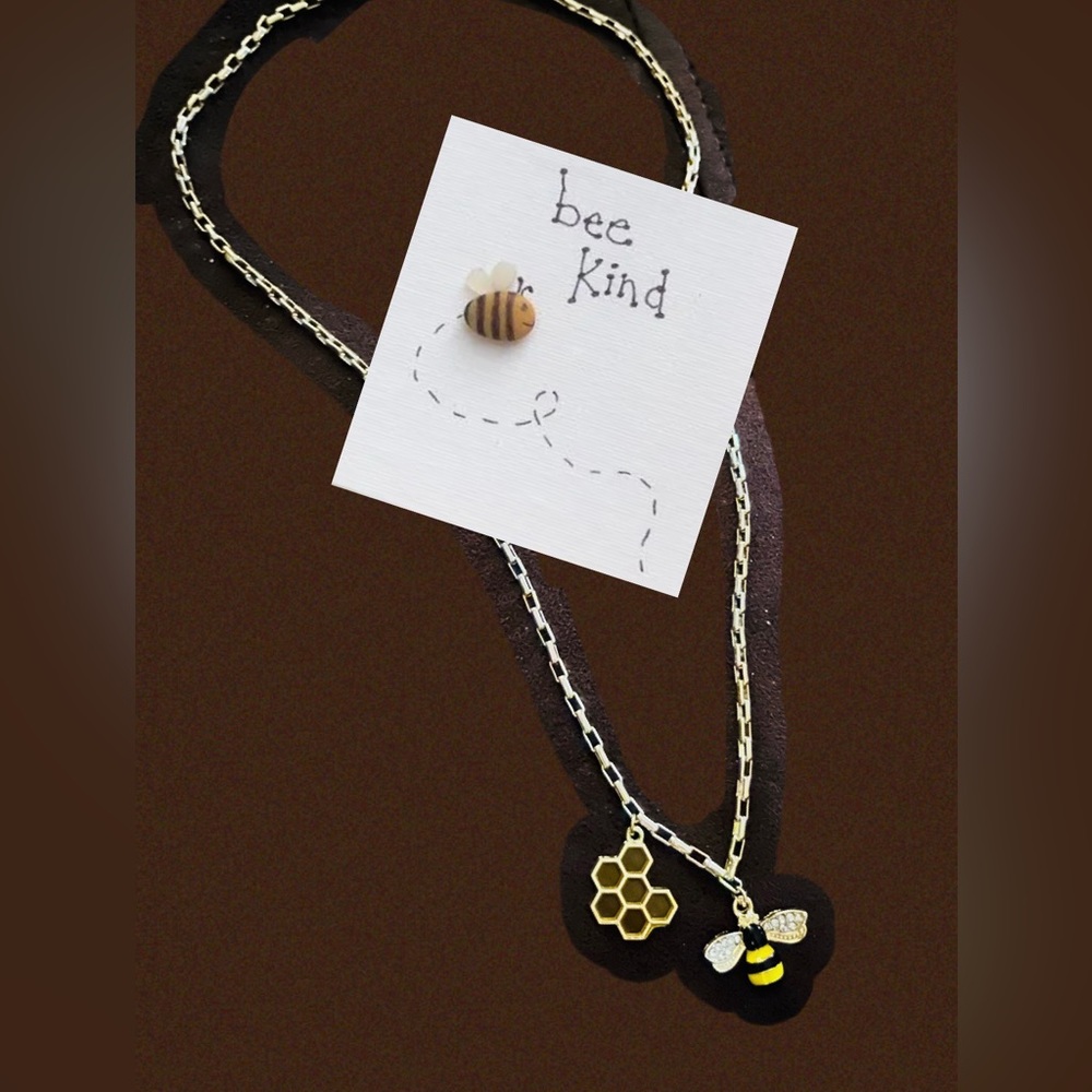 20” Gold , enamel /crystal “Bee” necklace with honeycomb charm. NWT